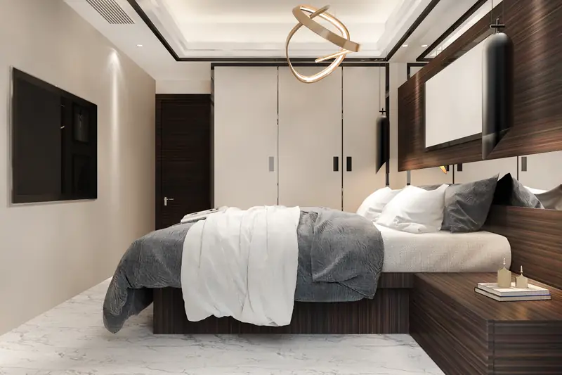 Dormitório planejado com guarda-roupa sob medida e painel de TV