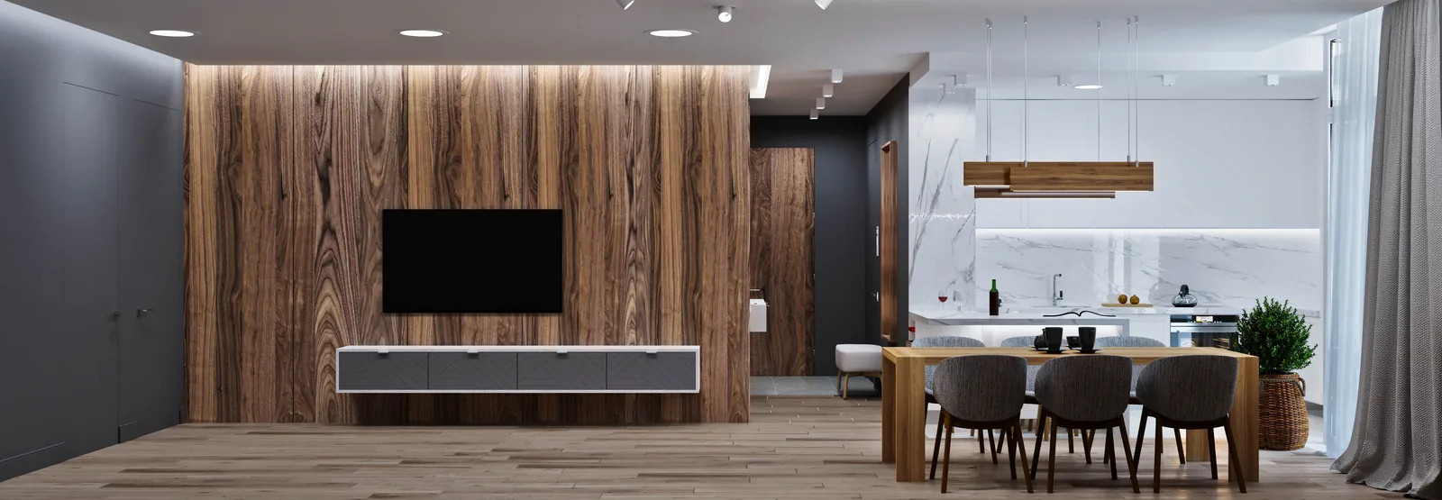 Ambientes integrados com painel de madeira, sala de jantar e cozinha planejada